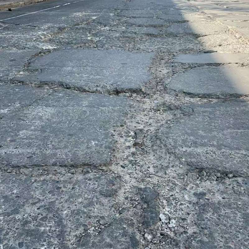 永仁路面起砂露石子修补料